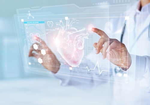 Medicine doctor and stethoscope touching icon heart and diagnostics analysis medical on modern virtual screen interface network connection. Medical technology diagnostics of heart concept